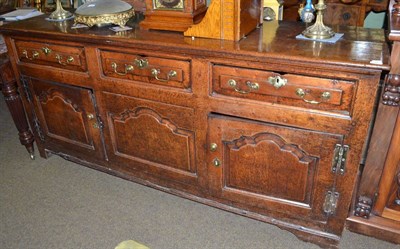 Lot 1541 - An 18th century oak dresser