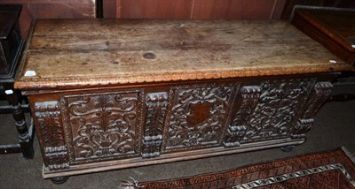 Lot 1548 - A 17th century carved cassone with carved panels and corbels