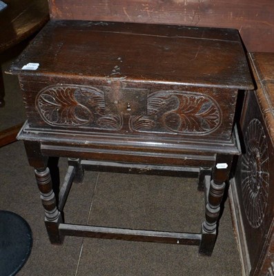 Lot 1549 - Carved oak bible box on later stand