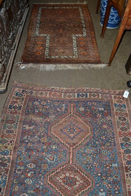 Lot 1555 - Balouch prayer rug, West Afghanistan, the diamond lattice field of hooked guls beneath the...