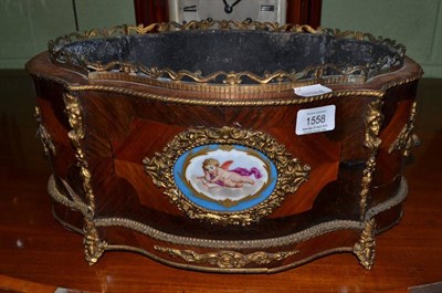 Lot 1558 - A Louis XV style kingwood and tulipwood planter