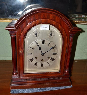 Lot 1559 - A chiming table clock, circa 1910, arched pediment, 7-inch arched dial, two dials for fast/slow and