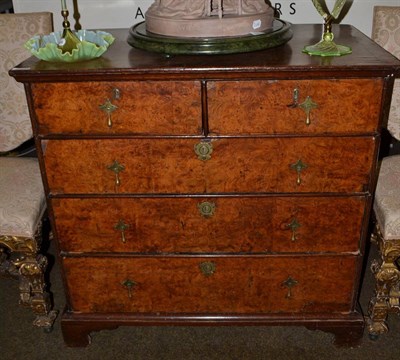 Lot 1564 - An 18th century walnut and oak chest