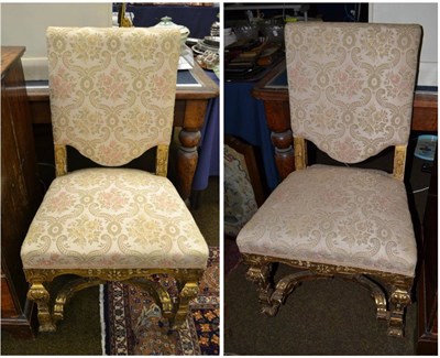 Lot 1565 - A pair of gilt chairs with carved stretchers