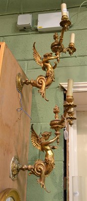 Lot 1566 - A pair of Victorian gilt bronze dragon wall lights, originally for gas, with diamond...