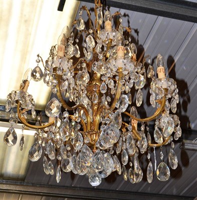 Lot 1578 - A ten branch gilt metal chandelier with cut glass drops (ex Trawsgoed Mansion)