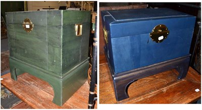 Lot 1636 - A green leather and brass bound trunk raised on Chinese style stand and a smaller blue example