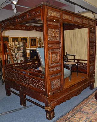 Lot 1655 - 19th century Chinese bed with fret carved panels