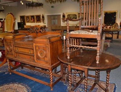 Lot 1672 - 1930s oak sideboard, drop leaf table and set of five barley twist dining chairs