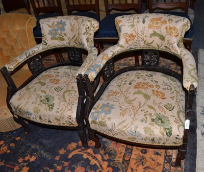 Lot 1676 - Pair of ebonised tub shaped armchairs