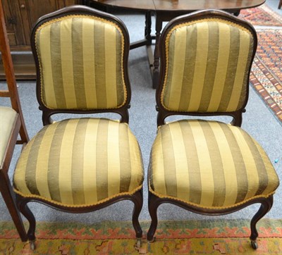 Lot 1682 - Pair of French chairs recovered in silk striped fabric