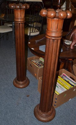 Lot 1687 - A pair of carved mahogany columns