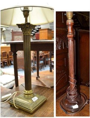 Lot 1693 - A mahogany table lamp base with fluted column, 62cm high and a brass Corinthian column table...