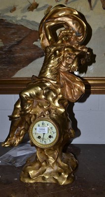 Lot 1698 - An Art Nouveau gilt spelter striking clock, base of case inscribed 'Marcel Debut 98', twin...