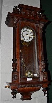 Lot 1699 - A Vienna type striking wall clock, circa 1900, glazed front and side panels, applied wooden mounts