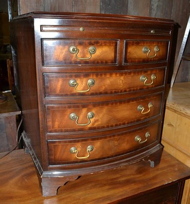 Lot 1717 - Reproduction mahogany chest with brushing slide