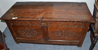 Lot 1739 - An 18th century English joined oak chest with hinged lid