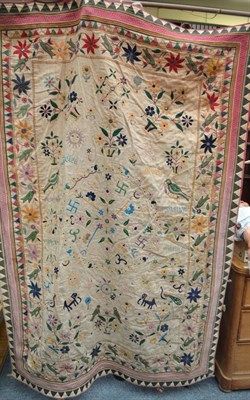 Lot 1761 - An embroidered Sind panel, North West India, the ivory ground worked with urns issuing flowers,...