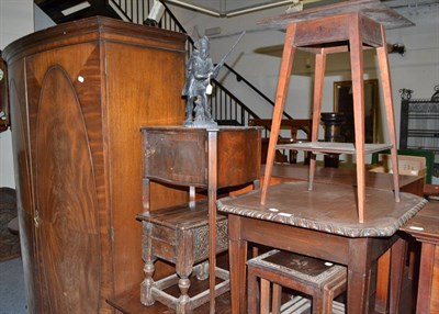 Lot 1762 - A mahogany bow fronted wardrobe, bedside cupboard, side table, nest of tables, plant stand,...