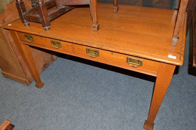 Lot 1768 - Late Victorian oak writing table fitted with two drawers