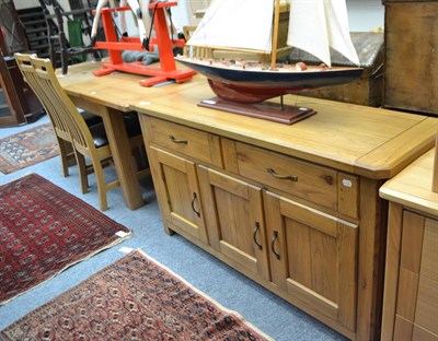 Lot 1778 - Reproduction oak dining room suite comprising extending dining table, four chairs and a sideboard