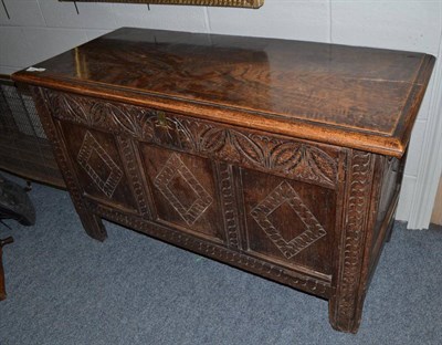 Lot 1803 - An early 18th century joined oak chest with lozenge carved panels (alterations)