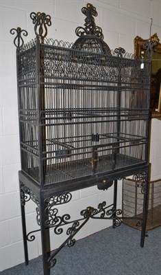 Lot 1808 - A wrought iron bird cage on stand, of recent date