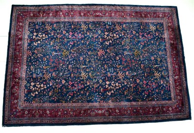 Lot 1818 - Indo-Persian carpet, North India, the field with an all over design of semi naturalistic...