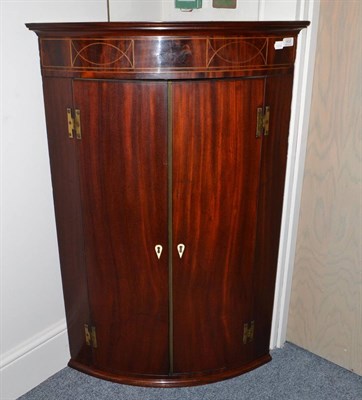 Lot 1832 - George III corner cupboard