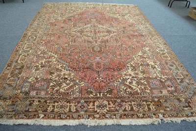 Lot 1842 - Heriz carpet, Persian Azerbaijan, the faded rose field with central medallion framed by...