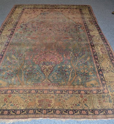 Lot 1843 - A Kirman prayer rug, south east Persia, the ice blue field centred by an urn and tree of life...