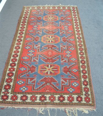 Lot 1862 - Lesghi style rug, probably West Turkey, the field with three stellar medallions enclosed by...