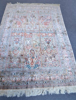 Lot 1868 - Silk Hereke design rug, the compartmentalised field with six mihrabs framed by urns issuing flowers