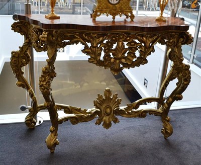 Lot 1879 - A gilt wood console table of recent date