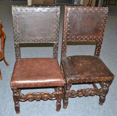 Lot 1880 - Set of six leather and oak chairs