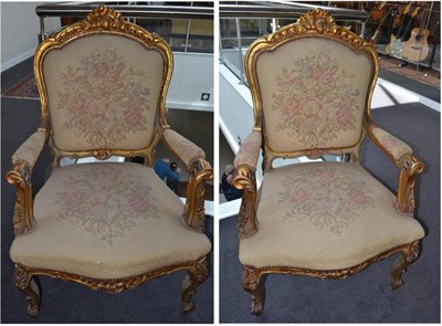 Lot 1885 - A pair of late 19th century gilt armchairs