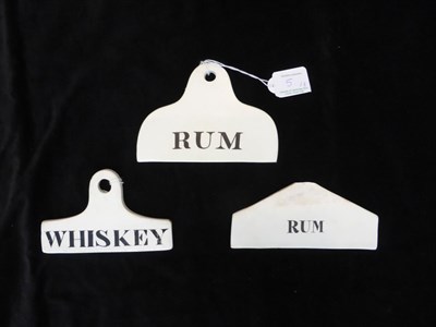 Lot 5 - Three 19th century bin labels, two inscribed for RUM, another for WHISKEY, the widest 14cm