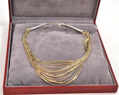 Lot 39 - A white and gilt metal multi-strand necklace, in a Georg Jensen case, length 43cm