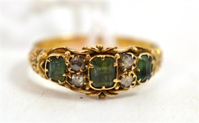Lot 55 - A Georgian ring, three green step cut stones spaced by pairs of rose cut diamonds, in yellow...