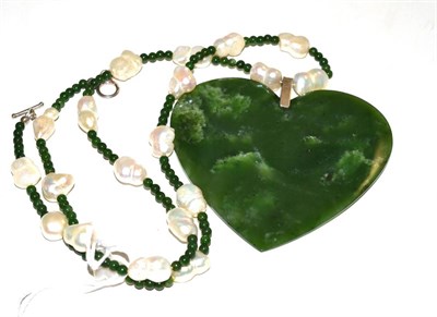 Lot 59 - A jade type and cultured pearl necklace and pendant, the green beads spaced at intervals with...