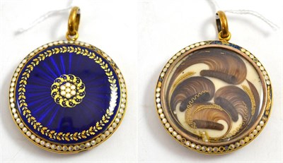 Lot 61 - A mourning locket, the large disk with locks of hair enclosed, within white enamelled dots, and the