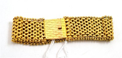Lot 71 - A fancy link bracelet, the wide form of brick links with bead detailed edges, length 18.5cm,...