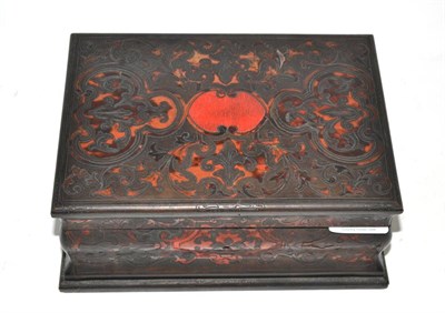 Lot 98 - A 19th century boulle work sewing box and key