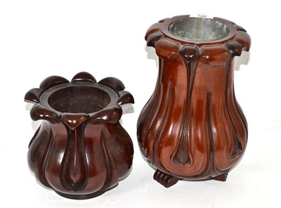 Lot 100 - Two carved mahogany bottle holders