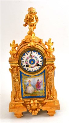 Lot 112 - A gilt metal and porcelain mounted striking mantel clock, circa 1890, surmounted by a winged...