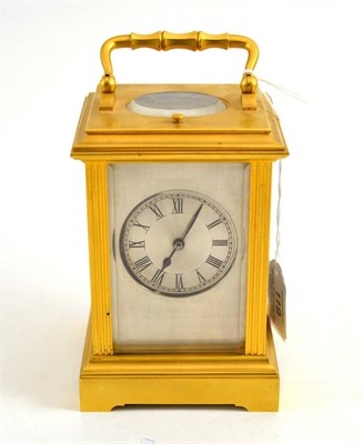 Lot 119 - A brass striking and repeating carriage clock, circa 1900, carrying handle and repeat button,...