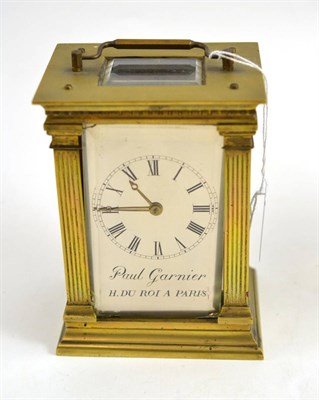 Lot 123 - A brass striking carriage clock, 20th century, carrying handle, silvered dial bearing a later...