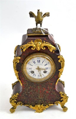 Lot 131 - A tortoiseshell and brass inlaid striking mantel clock, retailed by F.Villemsens, A Paris,...