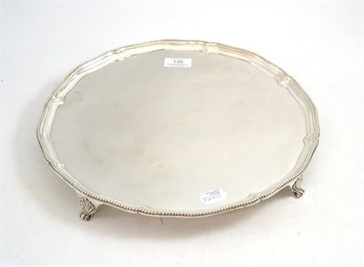 Lot 135 - A silver circular salver, London 1817