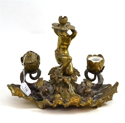 Lot 136 - Late 19th century ormolu inkstand, modelled with two dolphin inkwells, 29cm diameter